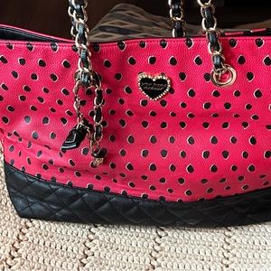 Betsy Johnson tote large in size.